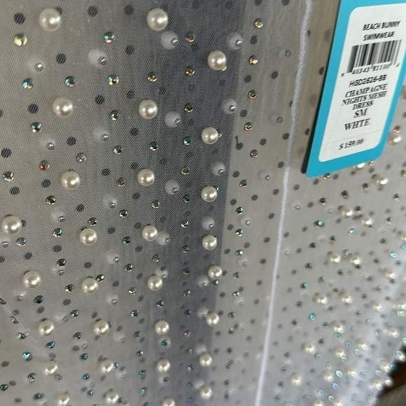 Champagne Nights Mesh Dress Revolve
Beach Bunny size small, New with Tags - Picture 11 of 13